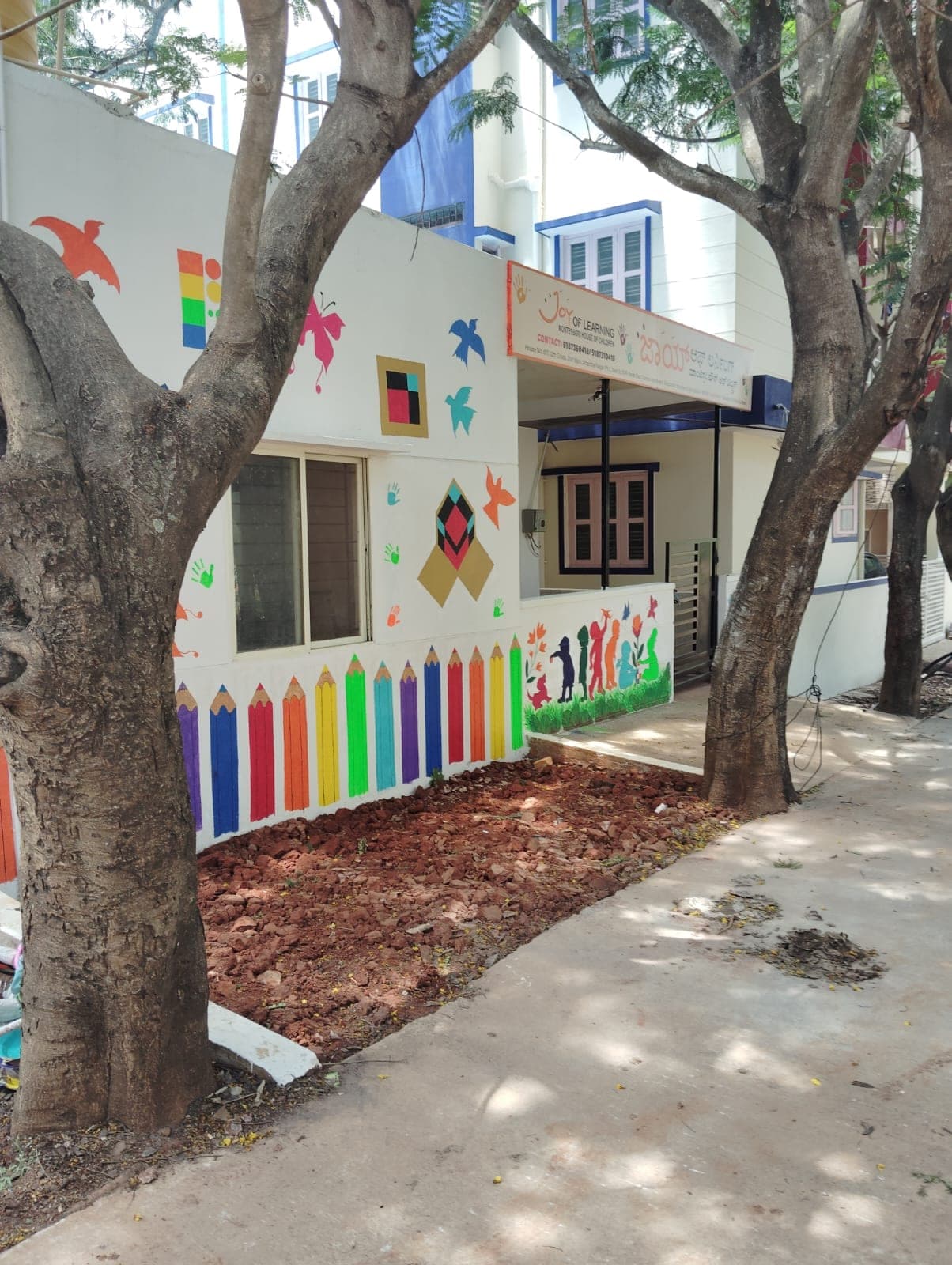 The JOL Montessori house, surrounded by greenery in Anantha Nagar